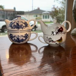 Two Small Teapots With Cups