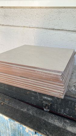 16 cream colored ceramic tiles