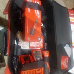 Milwaukee.  Rochet 12  Mm 3/8   And New Charger And  New. 125.00   