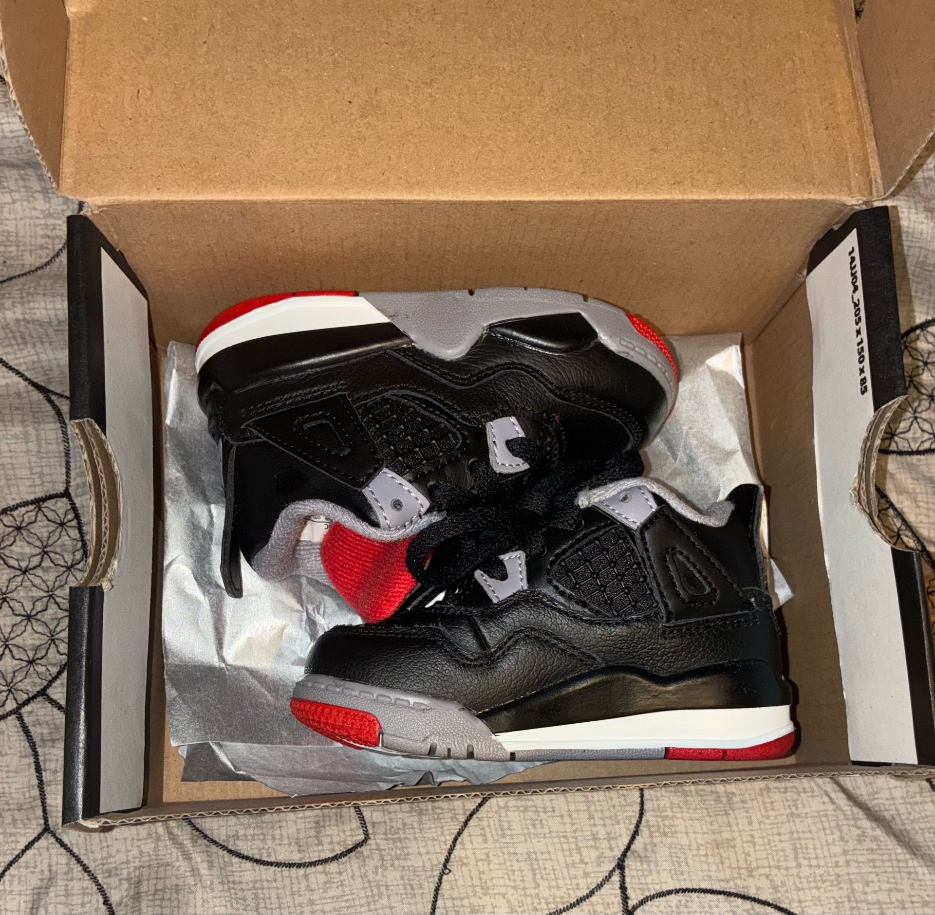 Black and red Jordan 4 Retro