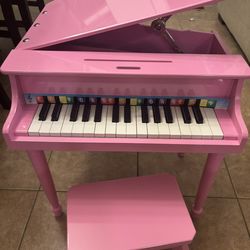 Neiman Marcus Pink Baby Grand Piano