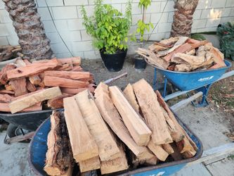 Firewood $35 per wheelbarrow wheelbarrow