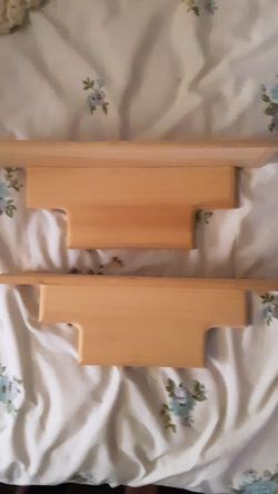 2 light wood matching shelves
