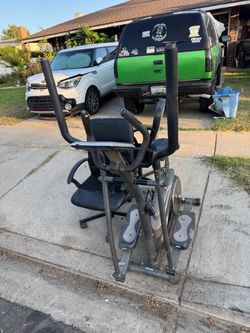 FREE.  2 office chairs and exercise bike