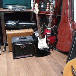 S Pectrum Electrick. Guitar. And Pevey. Amp. I75 Good. Cond 