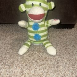 Usher Song Singing Sock Monkey Plush DJ Got Us Fallin In Love. Does have some snags/stains/piling & not sure if bottom use to be connected. But he sti