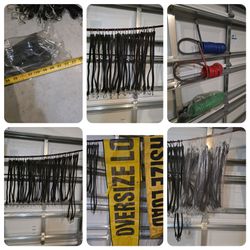 Large Lot of Bungee Cords and Oversize Load Banners