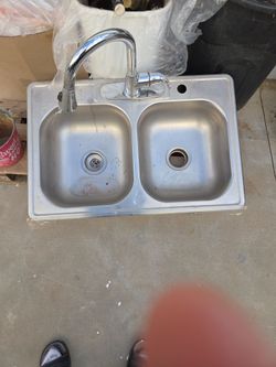 Sink with faucet