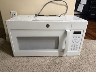 New GE 1.7 cu. ft. Over-the-Range Microwave in White