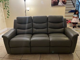 Grey couch with recliners