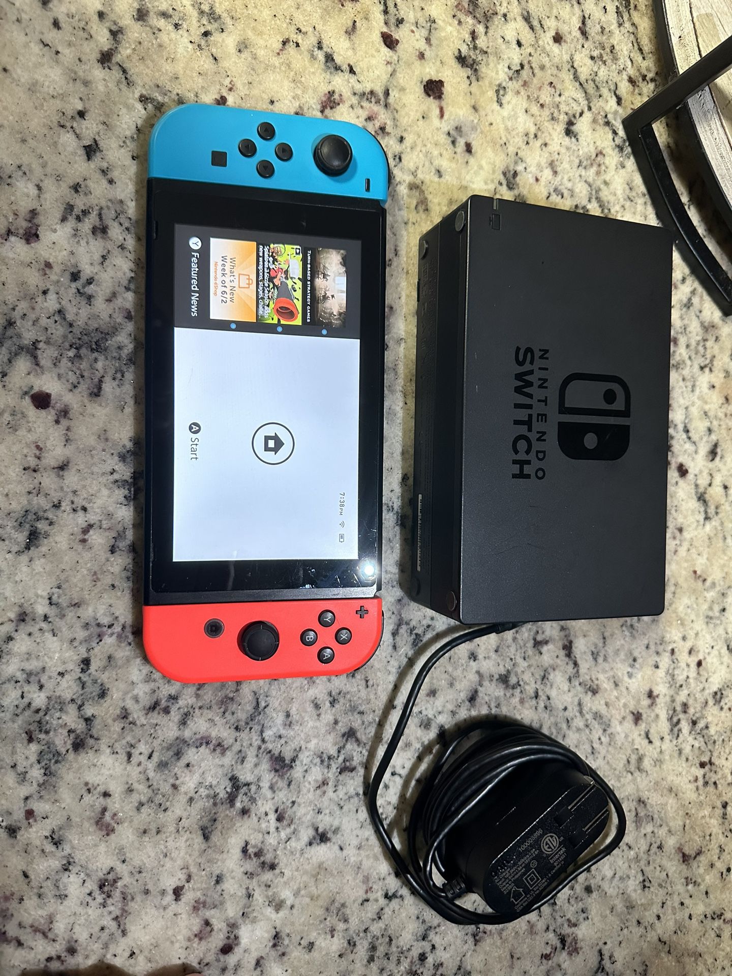 Nintendo Switch with dock and charger