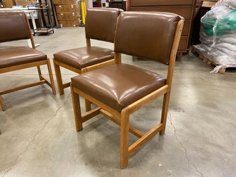 Vintage Wooden Chairs with Sleek Brown Upholstered Seats (Set of 4)