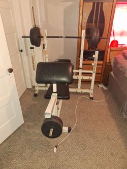 Keys 2300 strength trainer and weights.