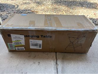Baby warming changing table