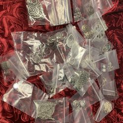 Lot of Sterling & silvertone Earrings , And More