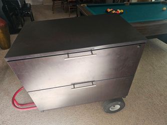 Black 2 Drawer filled cabinet. ke room.