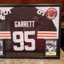 MYLES GARRETT OF THE CLEVELAND BROWNS, CUSTOM STITCHED FRAMED JERSEY.