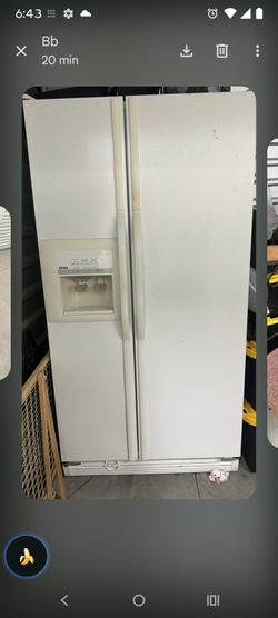 KENMORE REFRIGERATOR WITH WATER AND ICE DISPENSER IN GOOD CONDITION