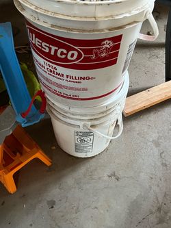 Countless White Plastic Buckets