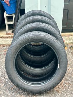 Set of 4 Goodyear Assurance Maxlife 215/55R17.  2 have just over 50% tread 2 have just under 50% tread