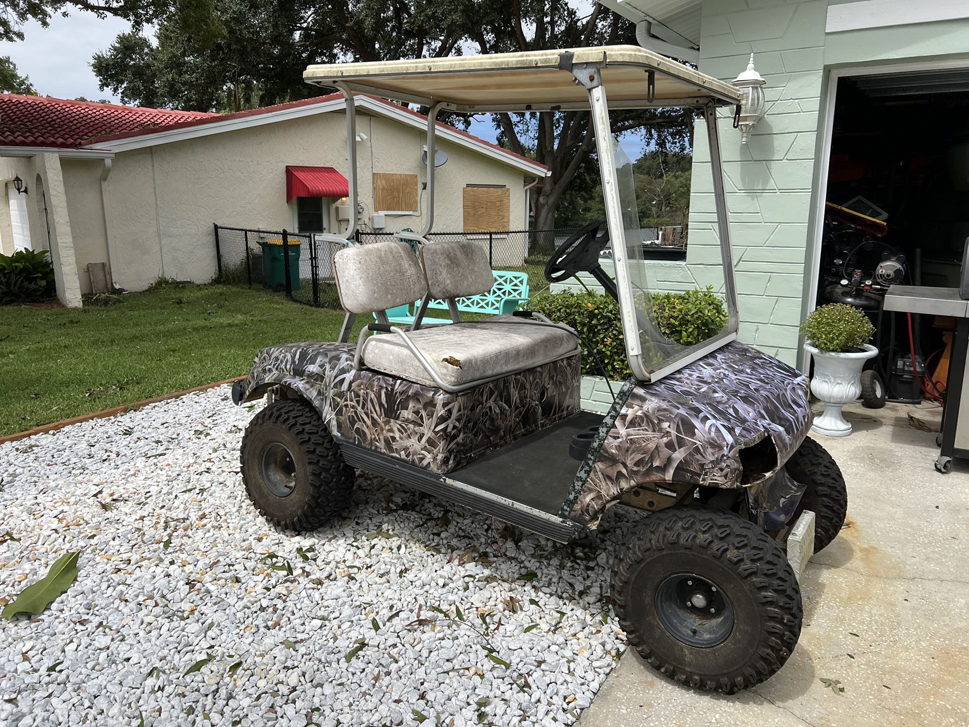 1999 Club Car Lifted Golf Car Needs everything except for Electric Motor