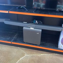 Polk audio sound bar with subwoofer, remote, and cords