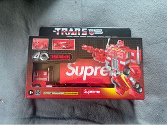 Supreme x transformers Optimus prime figure sealed