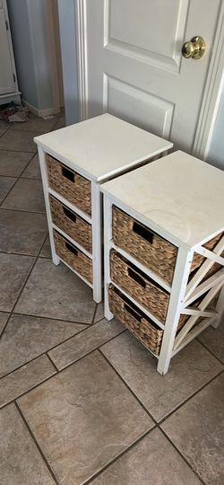 Two small white nightstands