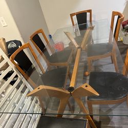Glass table with 6 chairs