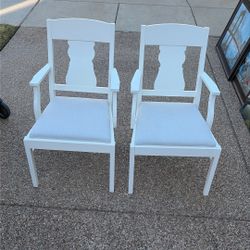 White Chairs With Gray Cushions 