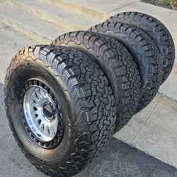 17" KMC rims w- 35" BfGoodrich KO2 Baja Champion Tires. $2100 