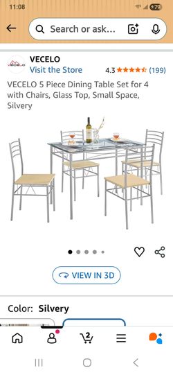 Glass top kitchen table and four chairs