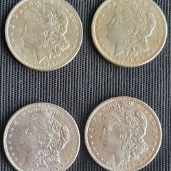 8 MORGAN SILVER DOLLARS IN TUBE 90% SILVER