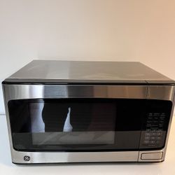 Microwave General Electric microwave model GCST11N1W1SS