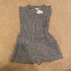 New floral Romper Size 3-4 years