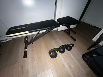 Workout bench and kettlebells