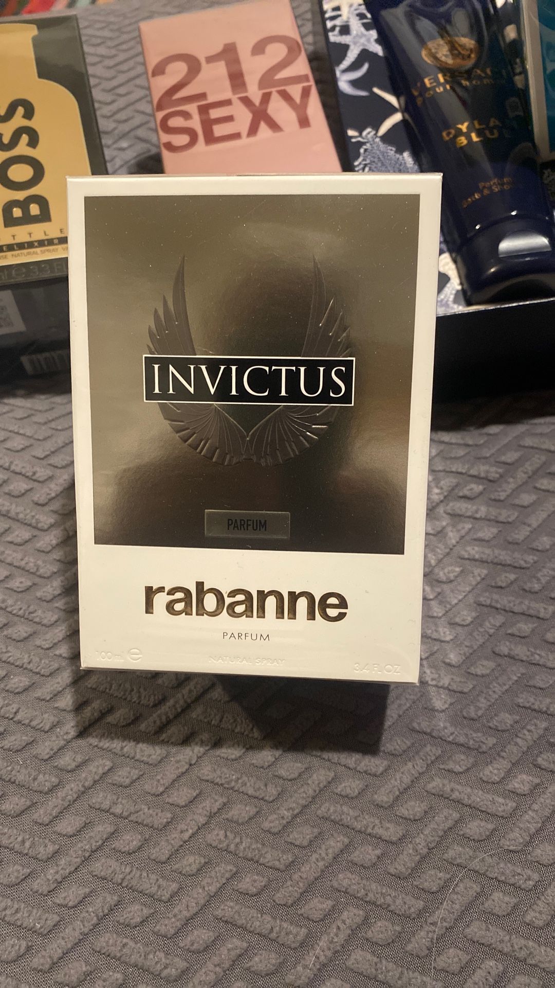Rabanne Invictus 3.4 Fl OZ De Perfum