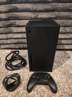 Xbox Series X 1tb with controller some Xbox One games and AKG Bluetooth headphones