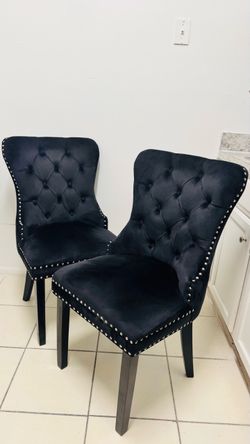 Black velvet tufted dining chairs