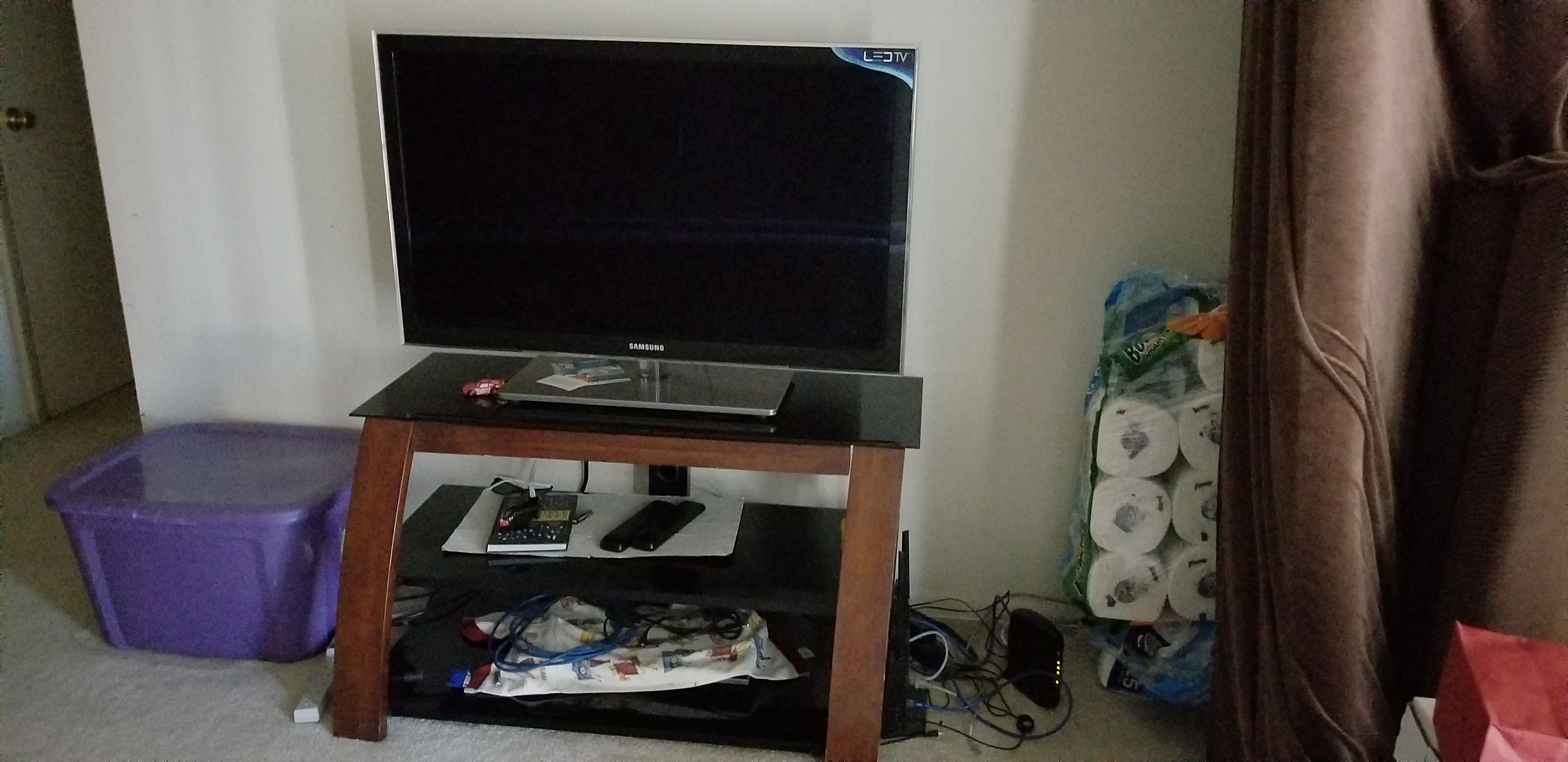 Samsung LED TV with TV stand.