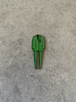Green jacket golf divot tool
