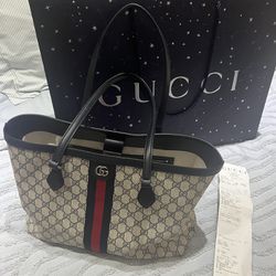 authentic Gucci logo purse