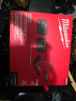 Milwaukee 6 port charger + 2- 12.0 Forge Batteries.