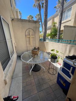 Outdoor glass top table