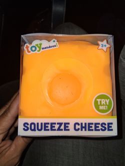 SQUEEEZY CHEESE "TOY MENDOUS