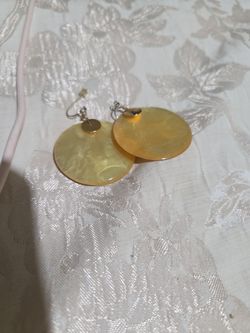 Yellow circle dangling earings