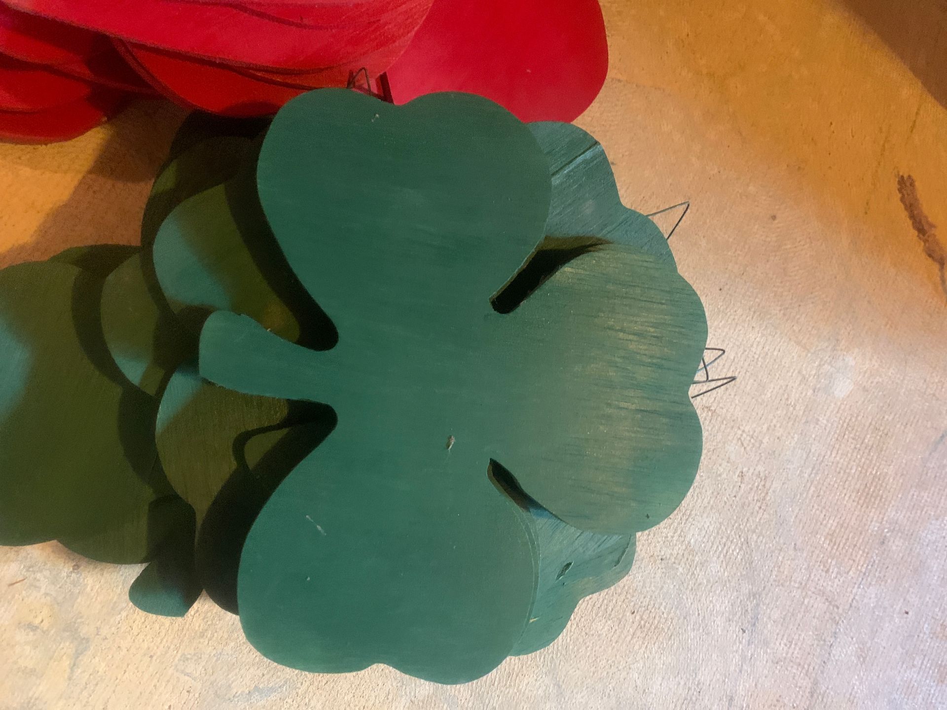 Shamrock and heart wooden cutouts about 20 of each shape