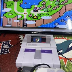 Super Nintendo Bundle With Mario world READY TO PLUG AND PLAYYY