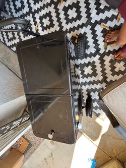 Black heavy duty retro ice chest on all terrain wheels