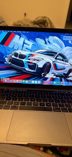 APPLE MACBOOK PRO TOUCHBAR 13’ EXCELLENT CONDITION WORKS PERFECT MY PERSONAL DAILY LAPTOP